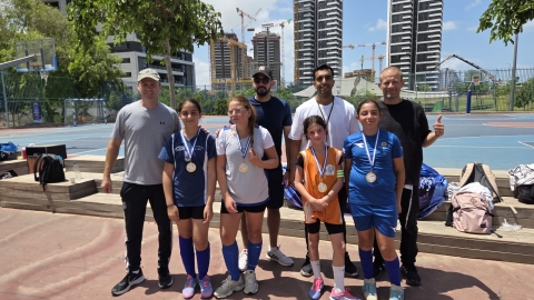 חגיגה ספורטיבית של הישגיות העצמה נשית ורוח קבוצתית.jpeg